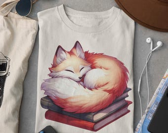 Cozy Fox Sleeping on Books T-Shirt: Whimsical Reader Gift