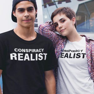 Conspiracy Realist T-Shirt: Funny Unisex Softstyle Tee