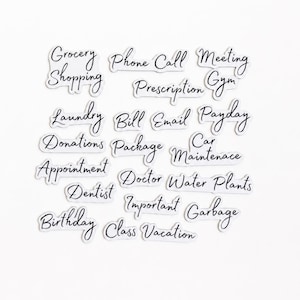 May include: A collection of white die-cut stickers featuring black cursive text for task organization. The words include Grocery Shopping, Phone Call, Meeting, Prescription, Gym, Laundry, Bill, Email, Payday, Donations, Package, Car Maintenance, Appointment, Doctor, Water Plants, Dentist, Important, Garbage, Birthday, Class, and Vacation.
