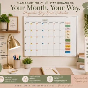 May include: A magnetic dry erase calendar with a white surface, silver frame, and a grid layout. The calendar features the text "Your Month. Your Way." and "Magnetic Dry Erase Calendar" at the top, with colorful month labels and circular markers.