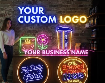 May include: Neon signs with the text "YOUR CUSTOM LOGO" and "YOUR BUSINESS NAME". Other signs include a coffee cup, flower, and a coffee cup with "DUTCH BRC". Two round signs say "The Daily Grind" and "Brewed Fres daily 1992".