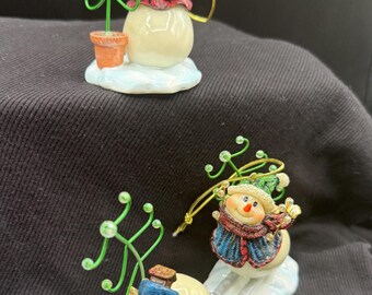 Home Interiors "Snow Play" Christmas Ornaments (Item #57096), released in 2004. Set of Three