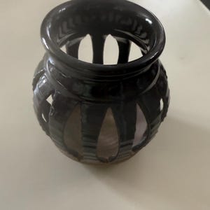 Studio pottery cutout tea light / candle lantern holder handmade by the American stoneware artist John Mills of Brown County Pottery.