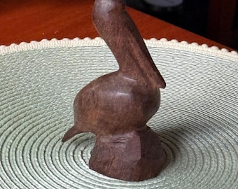 Hand Carved Ironwood Pelican Figurine: Rustic Coastal Decor