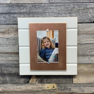 Distressed wood picture frame holds 4x6 photo metallic mat