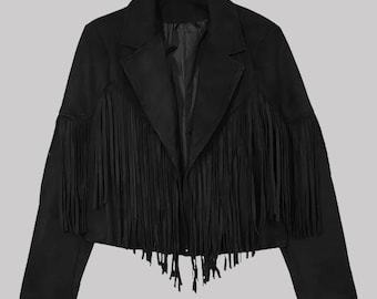 May include: A black jacket with fringe detailing. The jacket features a classic collar, long sleeves, and fringe accents along the front and sleeves. The jacket is a solid black color.