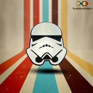 May include: A white and black stylized illustration of a Stormtrooper helmet. The helmet is set against a background of colorful vertical stripes.