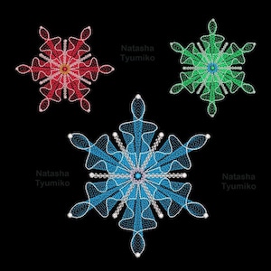 May include: Three embroidered snowflake designs in red, green, and blue on a black background. Each snowflake has intricate details and a central jewel-like embellishment. The text "Natasha Tyumiko" appears near each snowflake, with "Tyumiko 10 sizes" at the top.