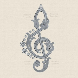 May include: A detailed, gray embroidered treble clef design with floral and scroll accents. The design includes flowers, leaves, and a decorative knot. The text "Tyumiko 6 sizes" is in the upper right corner. The text "Natasha Tyumiko" is repeated.