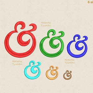 May include: Six embroidery designs of the letter "G" in different sizes and colors: red, green, blue, turquoise, orange, and brown. The designs are all in a cursive style with a flourish.