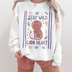 Stay Wild Lion Heart Sweatshirt, Cute Graphic Cozy Top, Inspirational Animal Lovers Gift, Trendy Casual Wear, Motivational Pullover