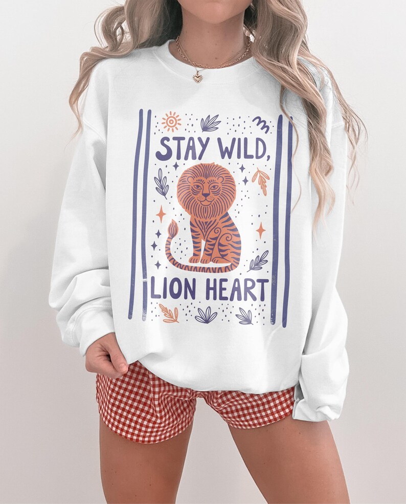 Stay Wild Lion Heart Sweatshirt, Cute Graphic Cozy Top, Inspirational Animal Lovers Gift, Trendy Casual Wear, Motivational Pullover