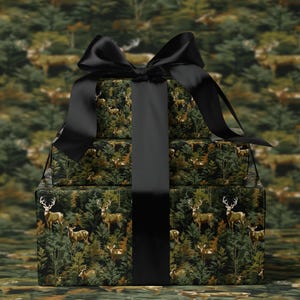 A gift box with a black ribbon tied around it, featuring a forest-themed design with deer and trees.
