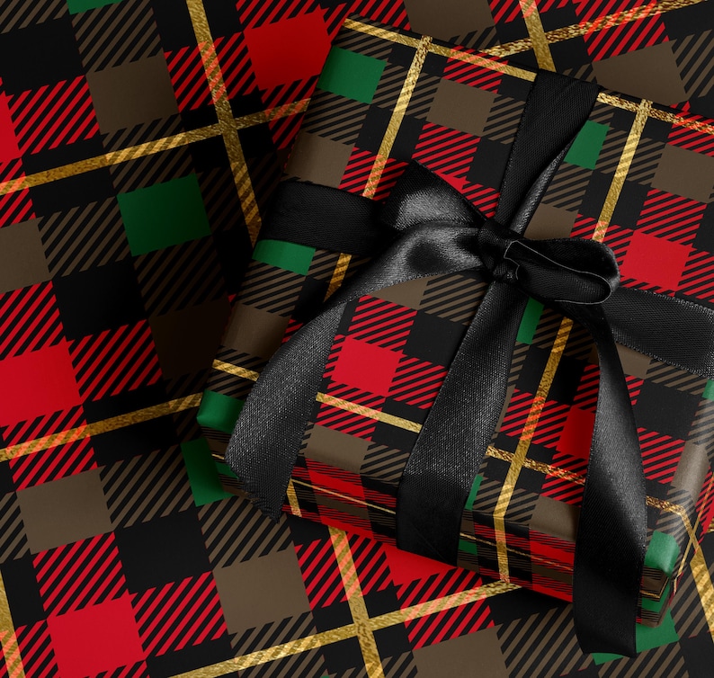 A gift wrapped in a checkered pattern with a black ribbon tied around it.
