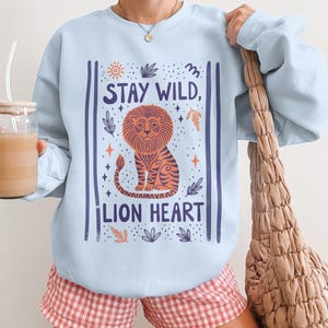 Stay Wild Lion Heart Sweatshirt, Cute Animal Print Pullover, Cozy Casual Outfit, Inspirational Quote Shirt, Graphic Sweatshirt