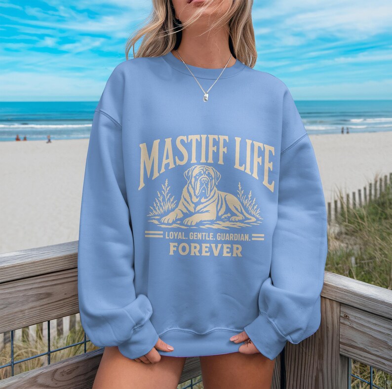Light blue sweatshirt with "Mastiff Life" and dog illustration.