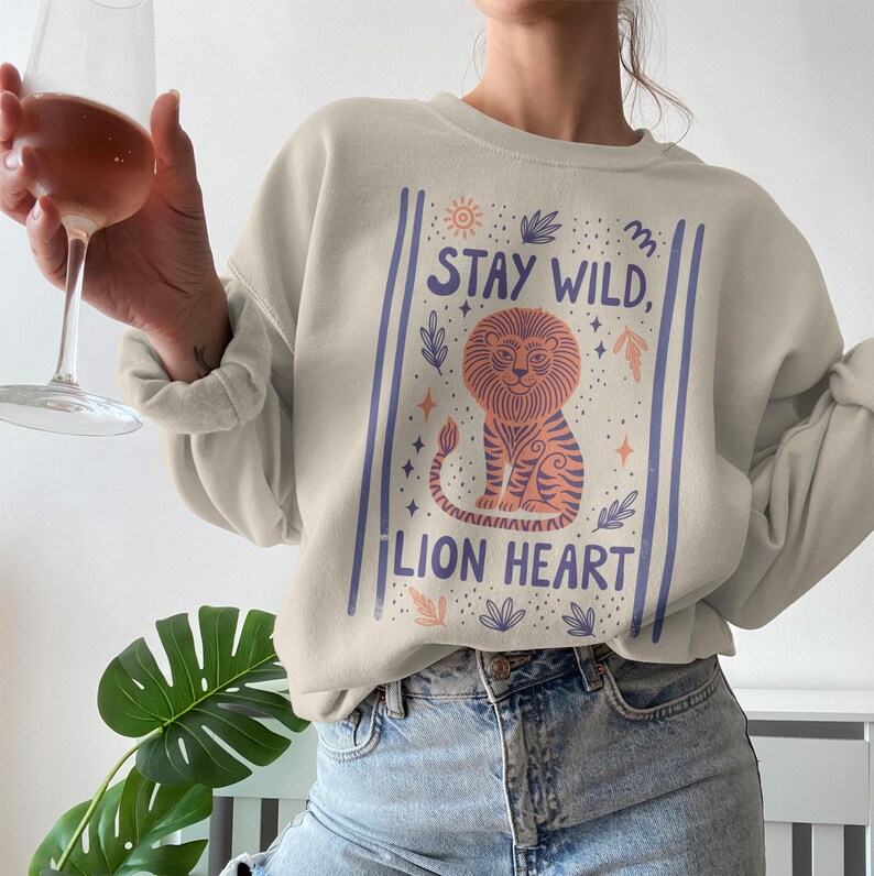 Stay Wild Lion Heart Sweatshirt, Cozy Graphic Sweatshirt, Motivational Lion Shirt, Inspirational Animal Lover Gift, Cute Casual Wear
