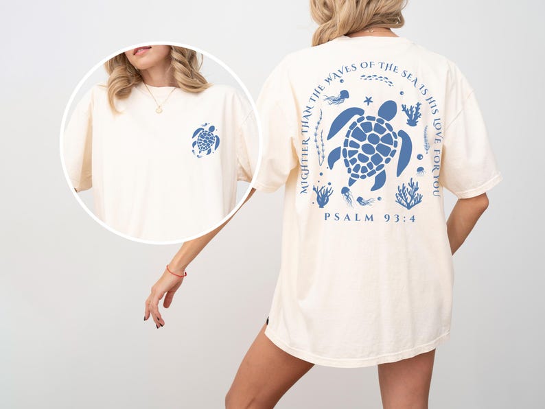 a woman wearing a white shirt with a turtle on it