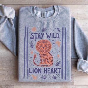 Stay Wild Lion Heart Sweatshirt, Animal Graphic Pullover, Cute Lion Sweatshirt, Cozy Fall Wear, Unisex Gift Idea, Eco Friendly Sweater
