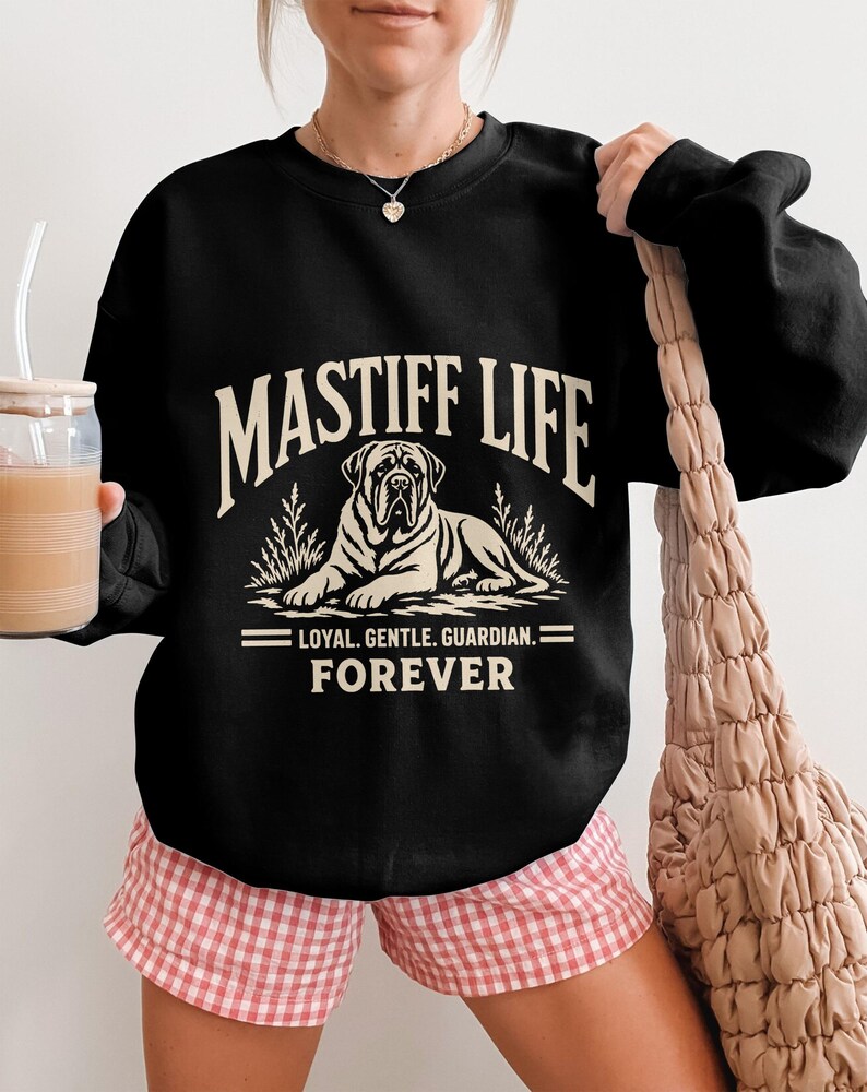 Black sweatshirt with "Mastiff Life Loyal Gentle Guardian Forever" text and dog graphic.