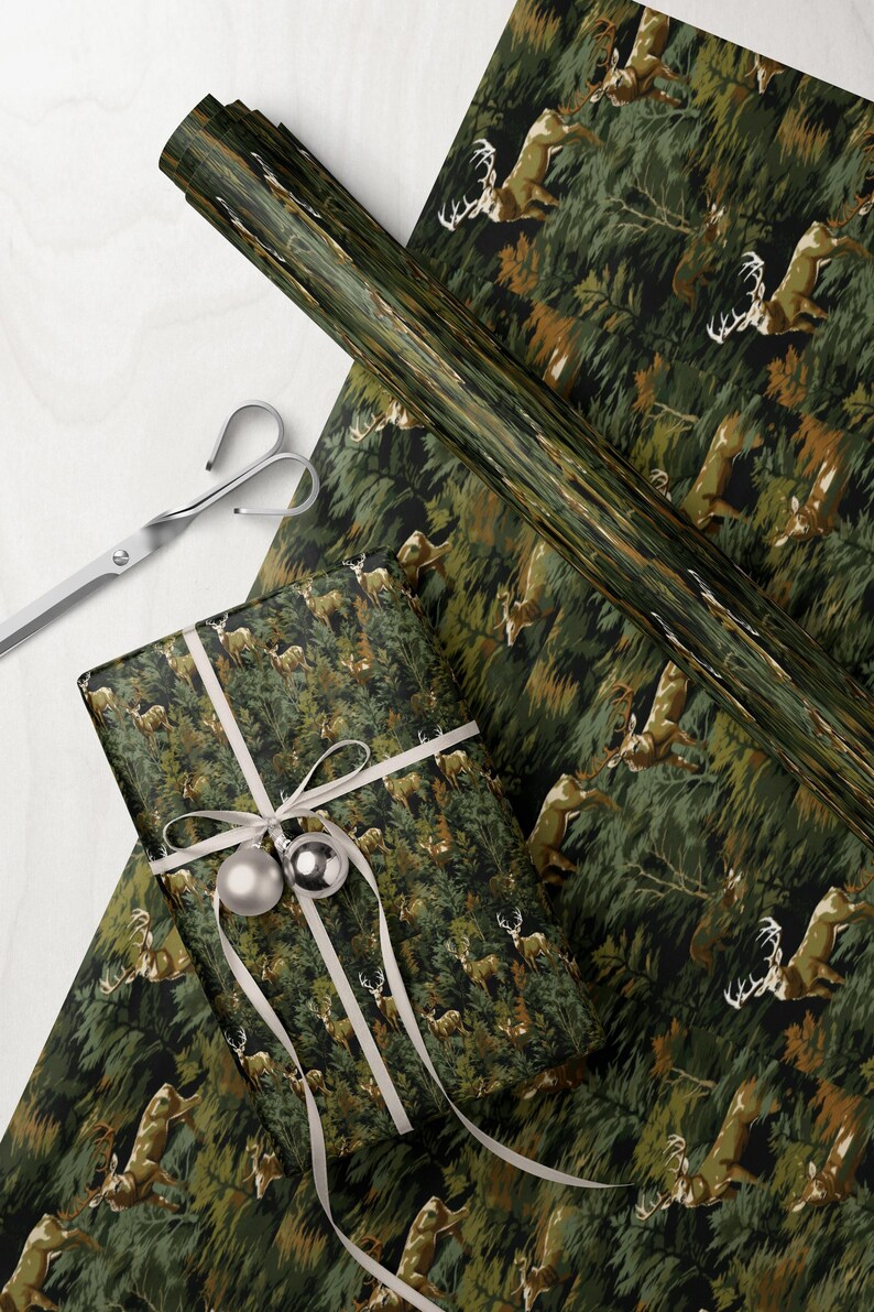 a gift wrapped in a patterned wrapping paper with a deer design, along with a pair of scissors and a piece of paper with a similar deer pattern.