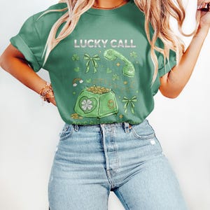 Lucky Call Green T-Shirt, Clover and Coin Design, Whimsical Graphic Tee, Perfect for Casual Wear, Trendy Gift Idea