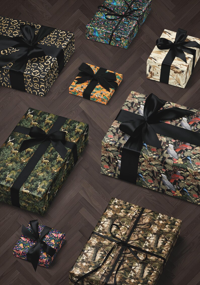 a collection of various gift boxes with different patterns and colors, including camouflage, floral, and abstract designs.