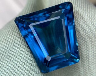 52ct | Flawless Electric Blue London Topaz | Trapeze Cut Loose Gemstone.