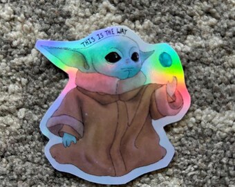 Holographic Mandolorian Baby Yoda Vinyl Sticker with Clear Shiny Protective Laminate Handmade Mando Art