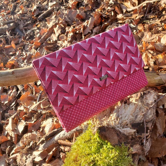 Hand made clutch bag out of recycled fabrics is a sophisticated gift for that, both fun and elegant lady. A unique and individual accessory.