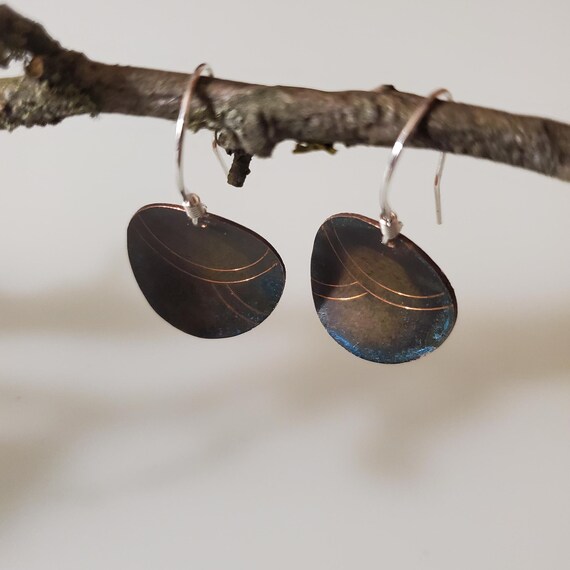 Earrings out 925 silver and of patinated, textured and engraved copper, are crafted to reflect my style of work.    What a great gift!