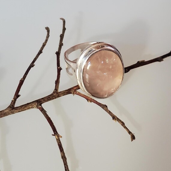 This gorgeous ROSE QURTZ is all hand made from stone cutting and polishing to manufacturing the 925 Sterling Silver ring.