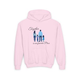 May include: Pink hoodie with a graphic of a family of four standing together. The text "Together is our favorite place" is printed below the graphic.