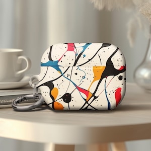 May include: A white Airpods case with a colorful abstract paint splatter design. The case has a black and silver keychain attached.