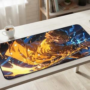 May include: A rectangular mousepad featuring a dynamic anime character in shades of yellow and blue. The design showcases a character with flowing hair and a determined expression, surrounded by stylized energy effects. The mousepad is on a white desk.