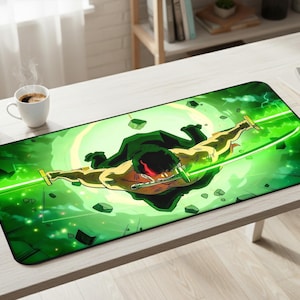 May include: A rectangular mouse mat with a dynamic illustration of a character in green and yellow tones, wielding swords against a vibrant green background. The design includes a green aura and scattered geometric shapes.