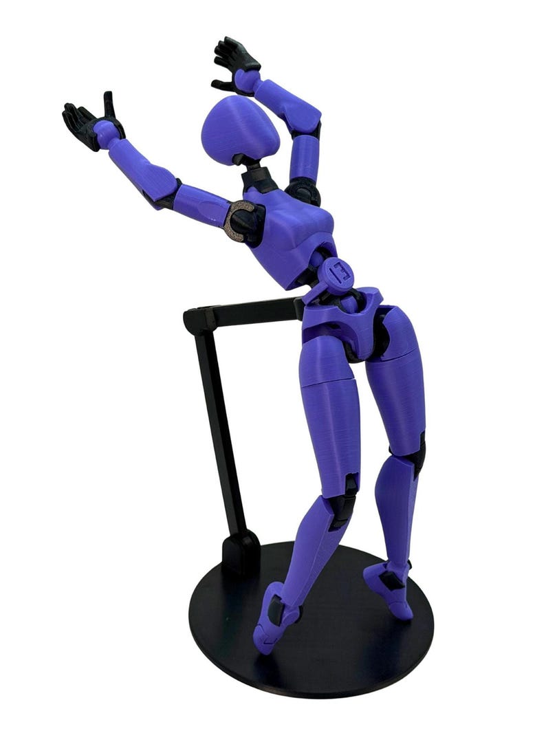 A purple 3D-printed articulated action figure arching backward while supported by a black stand on a circular base.