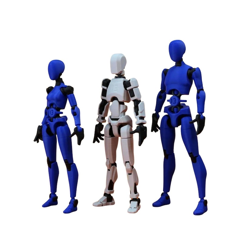 Three articulated 3D-printed action figures standing side-by-side, with the left and right figures in blue and the center figure in white with black joints.