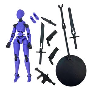 A purple and black action figure laid out with various accessories including swords, a rifle, extra feet, and a display stand.