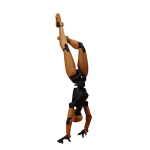 A tan and black articulated action figure performing a handstand against a white background.