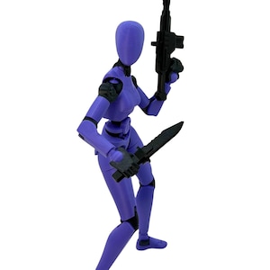 A purple and black articulated action figure holding a rifle and a knife against a white background.