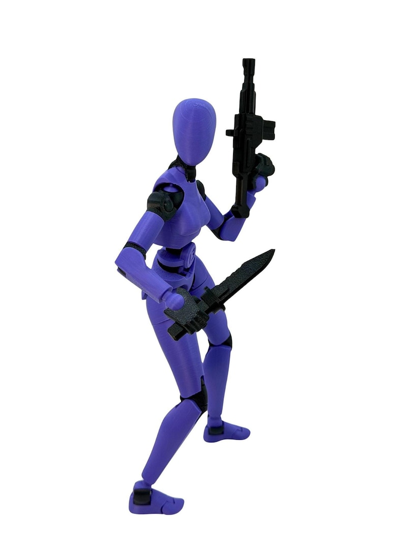 A purple and black articulated action figure holding a rifle and a knife against a white background.