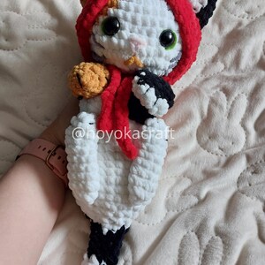 Calico cat crochet plush with ladybug hat