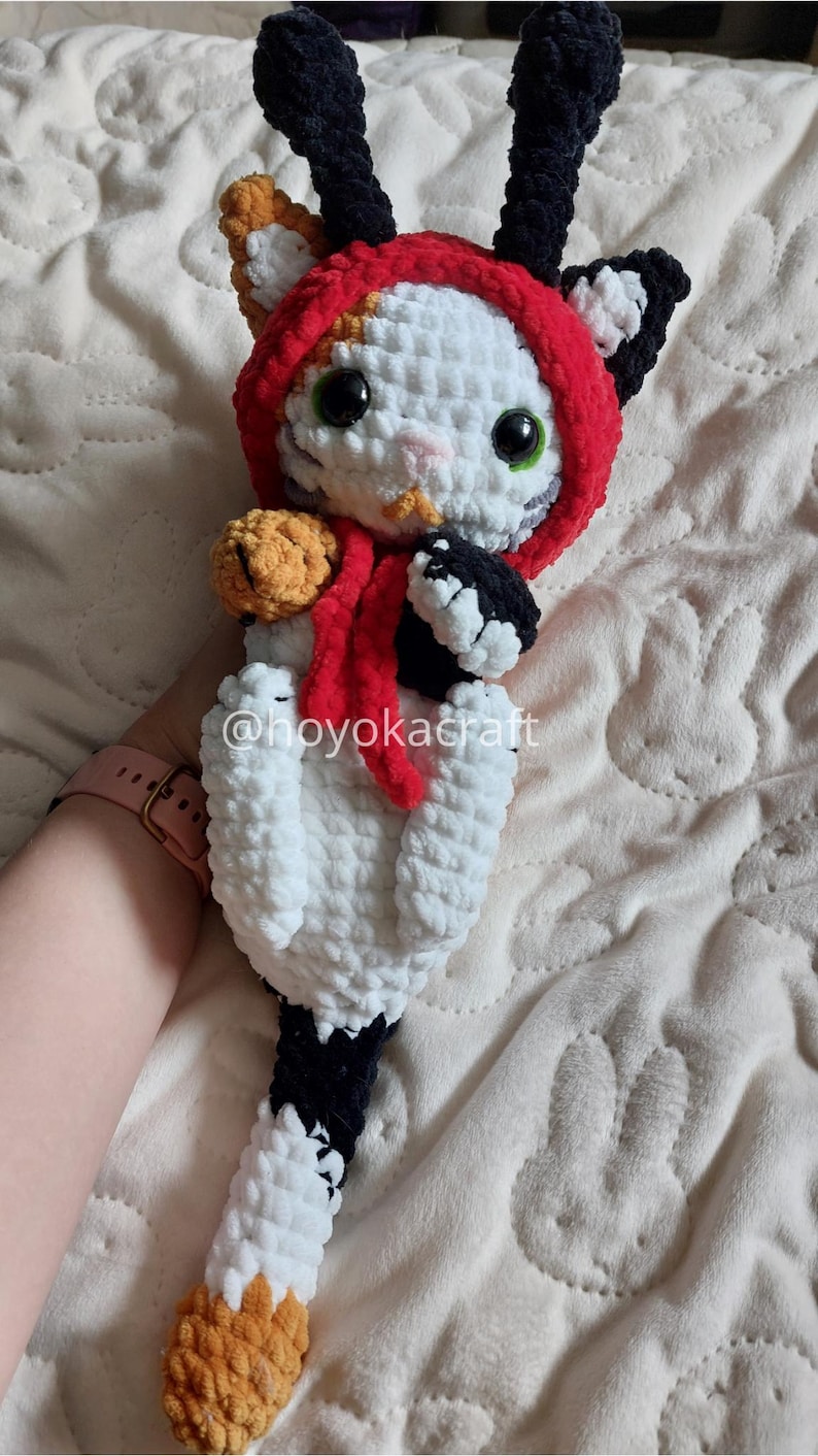 Calico cat crochet plush with ladybug hat