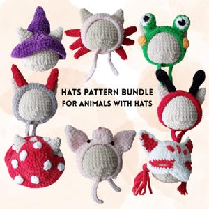 May include: A collection of handmade crochet animal hats in various designs. The hats include a purple wizard hat, a pink cat hat with red accents, a green frog hat, a gray devil hat, a red and white mushroom hat, a pink pig hat, and a white and red fox hat. Text reads: HATS PATTERN BUNDLE FOR ANIMALS WITH HATS.