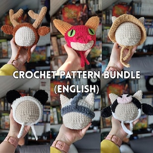 Puede incluir: Se muestran seis sombreros de animales de ganchillo hechos a mano, incluyendo un reno, una criatura roja, un gato, un ratón, un lobo y una vaca. Se muestra el texto "CROCHET PATTERN BUNDLE (ENGLISH)".