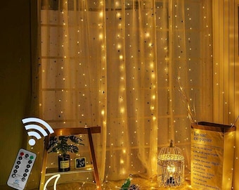 LED Curtain Fairy Lights , 300 LED  Bedroom/Christmas lights, Remote control string lights, Waterproof, Warm & Cozy Decor. (3 X 3 M )