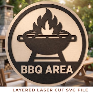 May include: A round wooden sign with a black BBQ grill design and the words "BBQ AREA" in bold letters. The sign features a layered laser-cut design with a light wood background and a dark wood border.