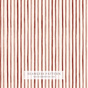 Peut inclure: Un motif sans couture composé de rayures verticales peintes à l'aquarelle dans des tons variés de terre cuite, de rouille et de rouge sourd sur un fond crème. Le texte SEAMLESS PATTERN POD & COMMERCIAL USE est centré en bas.