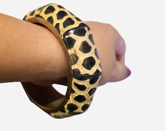 Brazalete vintage de latón y cuero con forma de jirafa